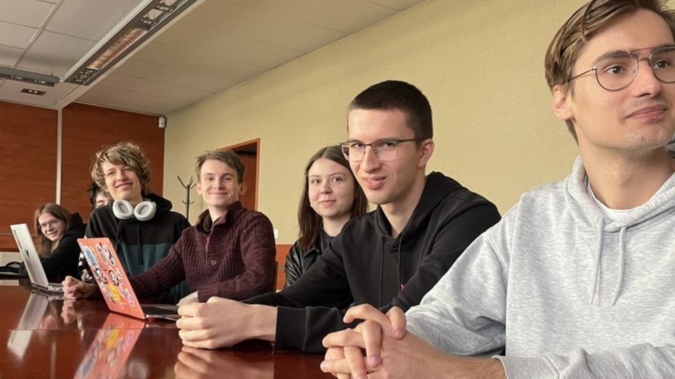 students sitting at a table
